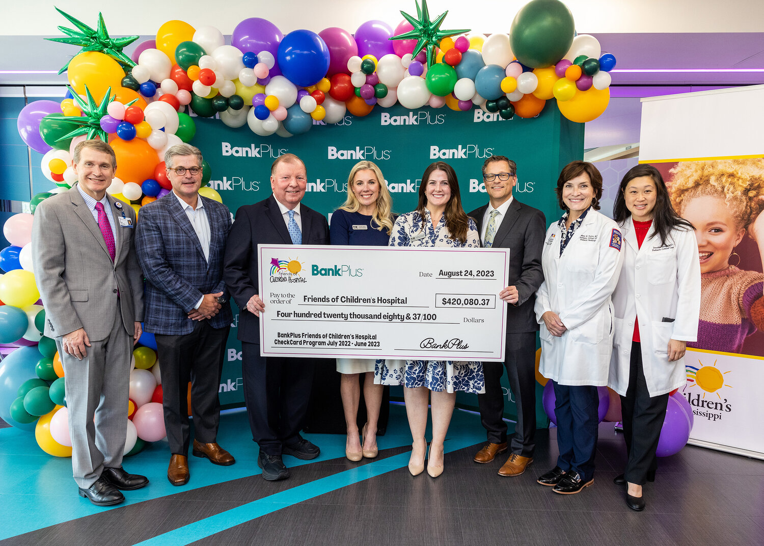 Bank plus honored with community room at Children's of Mississippi and